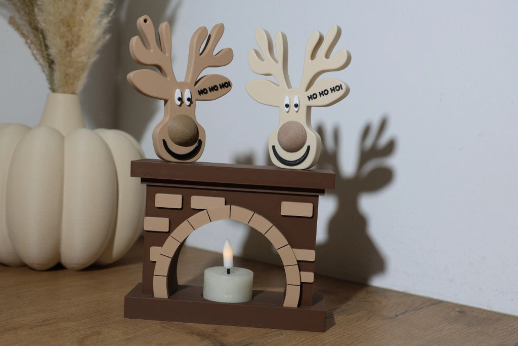 Mini chimenea decorativa navideña con espacio para una vela LED.
