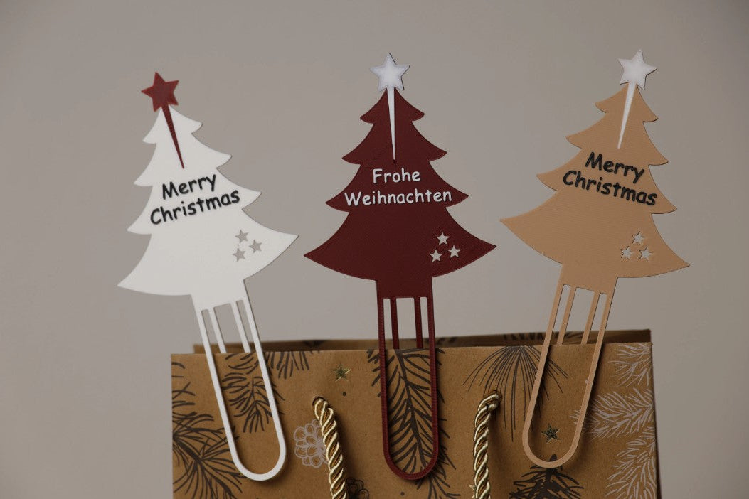 Clip decorativo con forma de árbol de Navidad.
